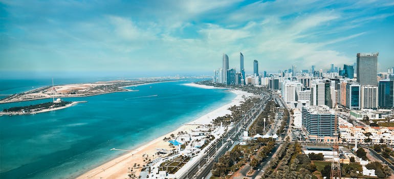 An aerial view of Abu Dhabi and beach, representing Personal Trainer Abu Dhabi