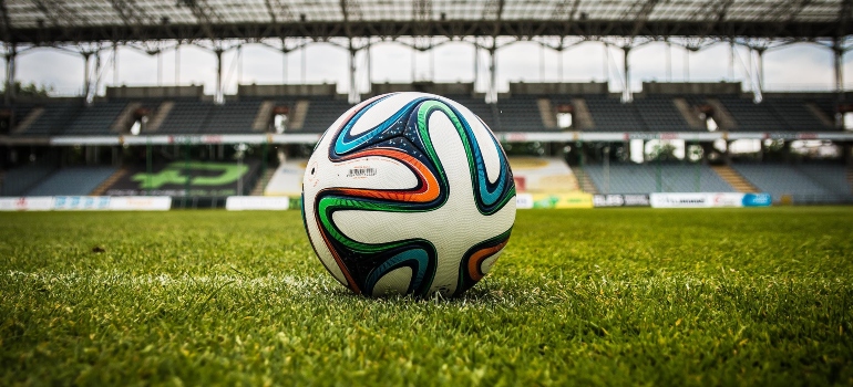 A ball on a football field. 