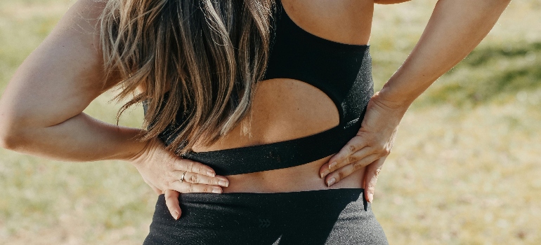 A Woman Having a Back Pain