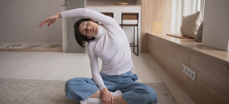 an image of a woman warming up before exercising