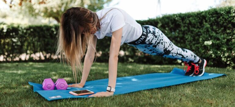 A woman exercising outside