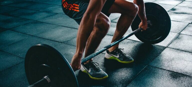 A person holding barbell