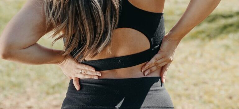 A woman having a back pain