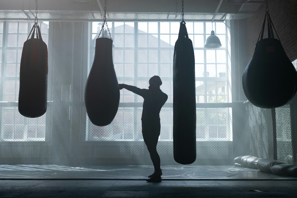A person working out and exploring the health benefits of boxing.