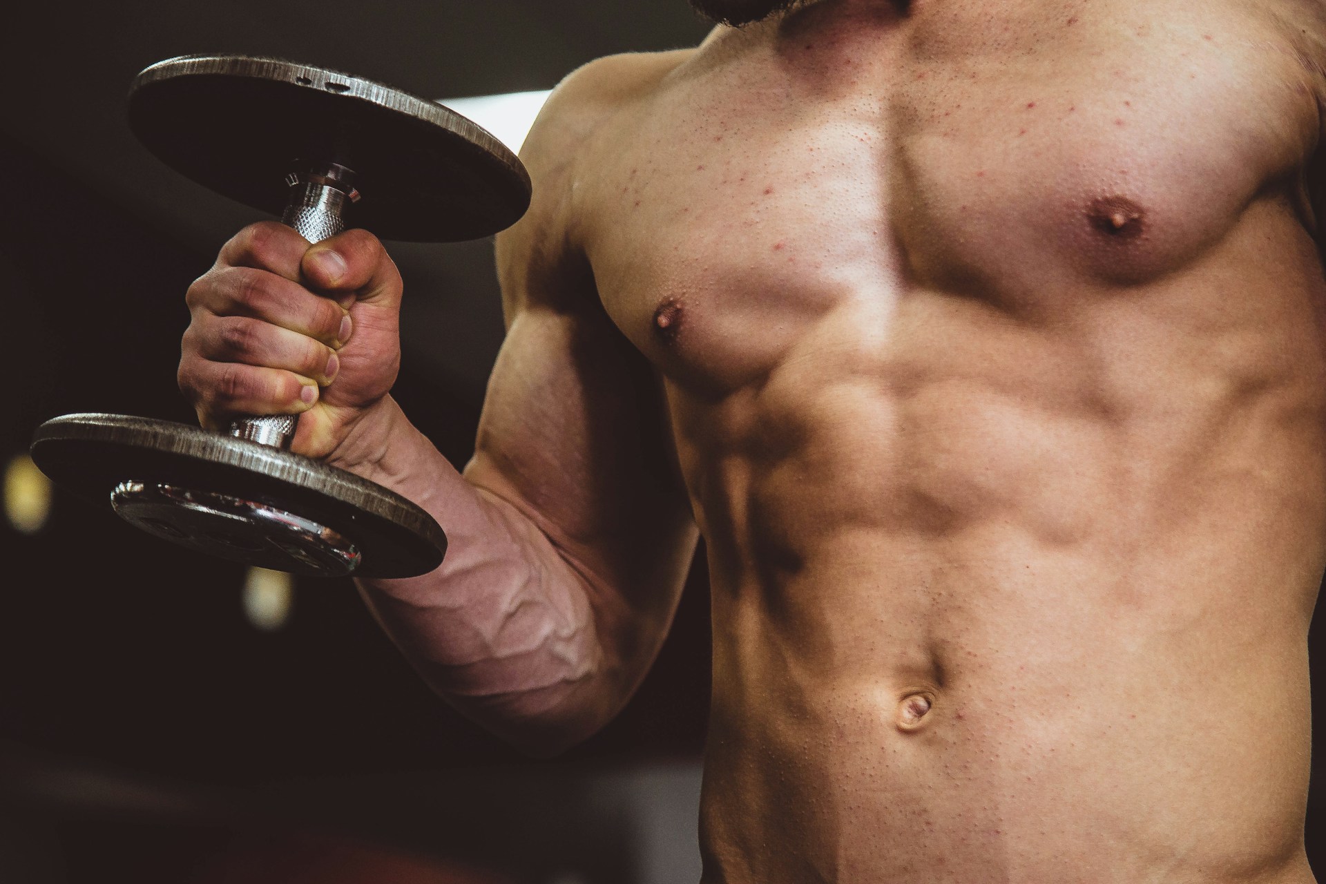 A person holding a dumbbell