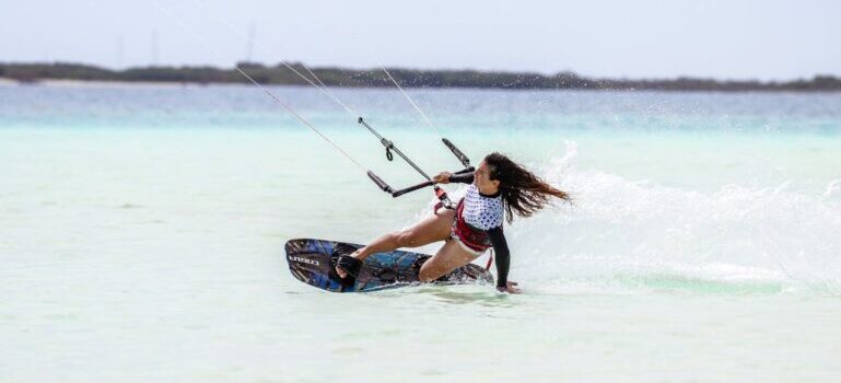 woman attending kitesurfing lessons Dubai offers