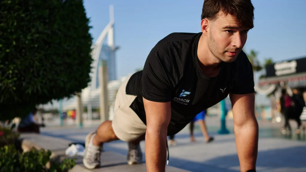 FitForce personal trainer, outdoor workout at Umm Suqeim beach with Burj Al Arab, Dubai